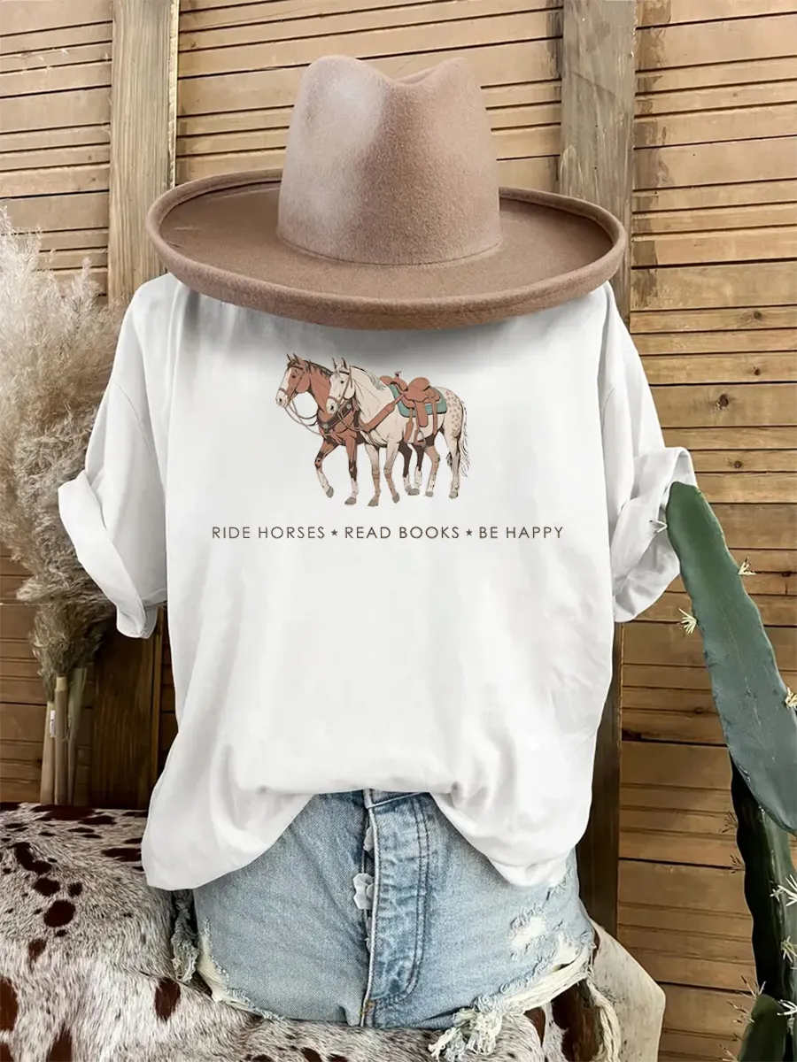 Riding horses, reading, happy slogan T-shirt