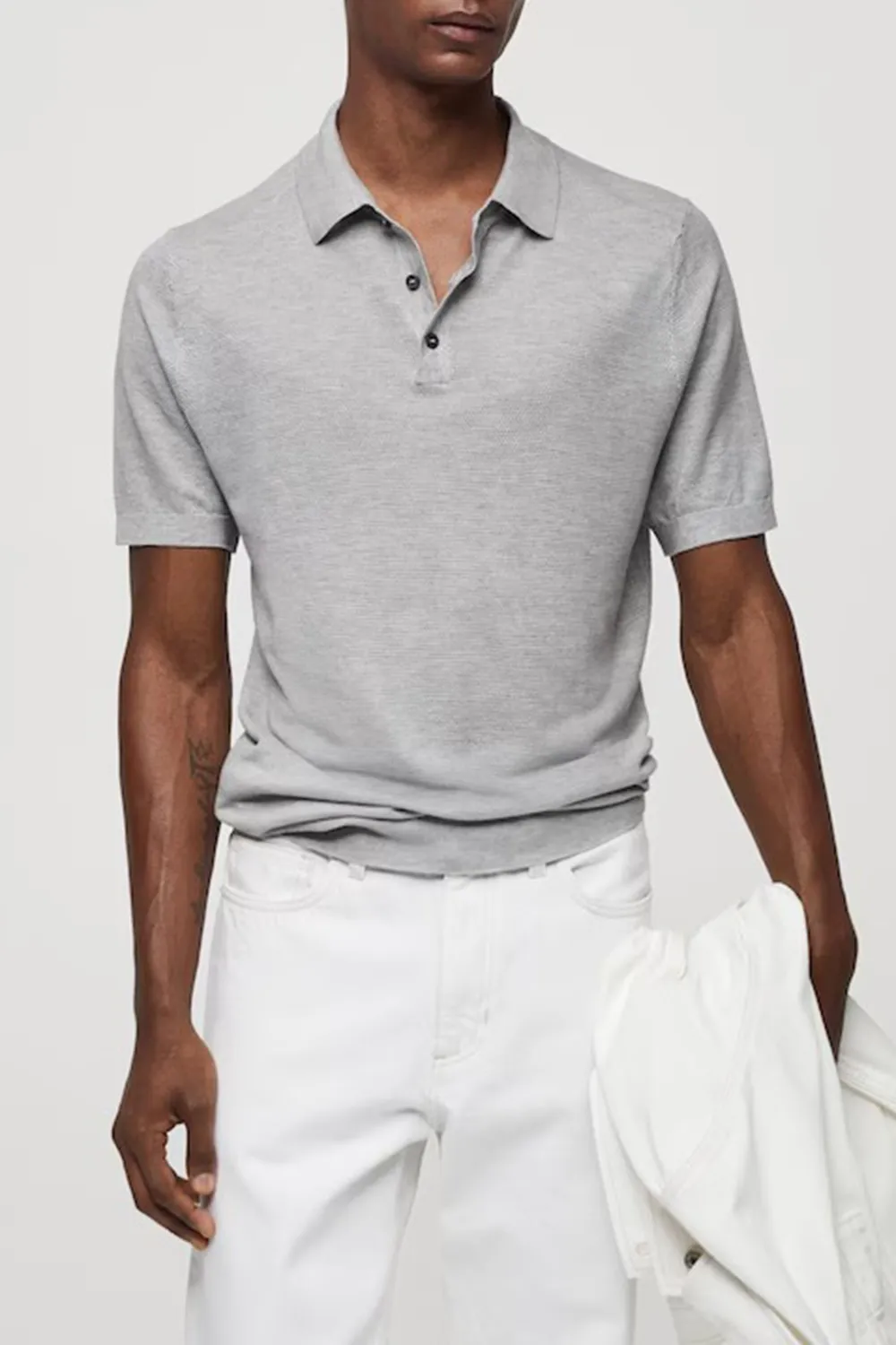 Buttoned micro-structure knitted polo shirt