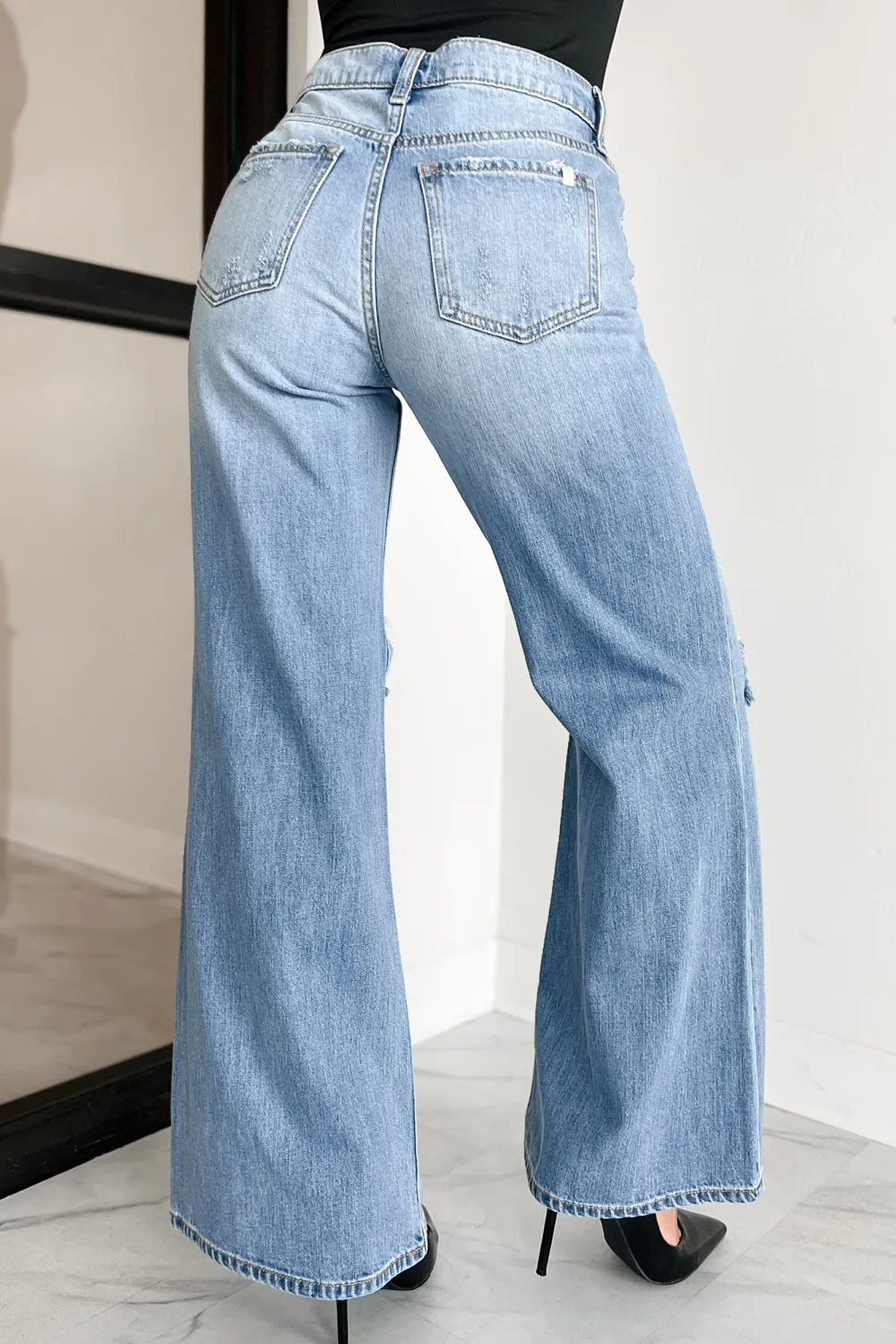 Kyra High Rise Distressed Wide Leg Sneak Peek Jeans