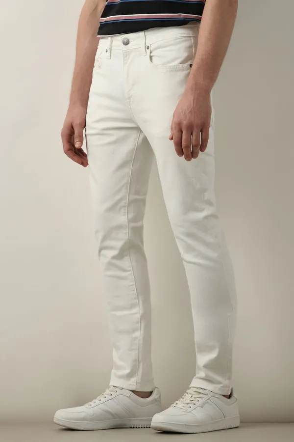 White Mid Rise Leon Slim Fit Jeans